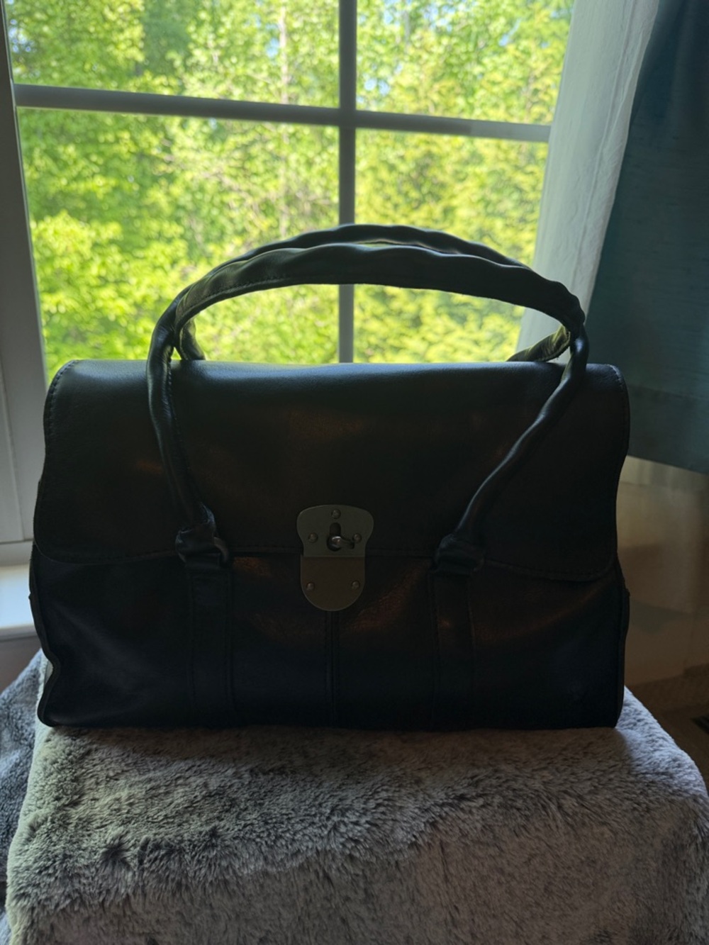 Patricia Nash Classic Black Leather Shoulder Bag with Turn-Lock Closure.